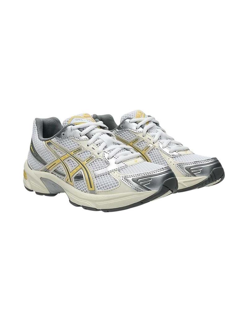 Sapatilhas Asics Gel 1130 amarelo e prateado para mulher.