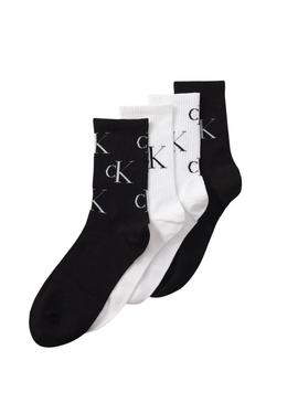 Caixa de presente com 4 pares de meias Calvin Klein com logotipos preto e branco para mulher.