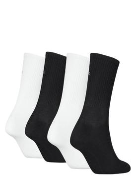 Caixa de presente com 4 pares de meias Calvin Klein com logo branco e preto para mulher.
