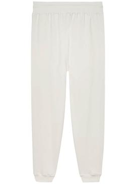 Calça Tommy Jeans Patch Terry bege para homem.