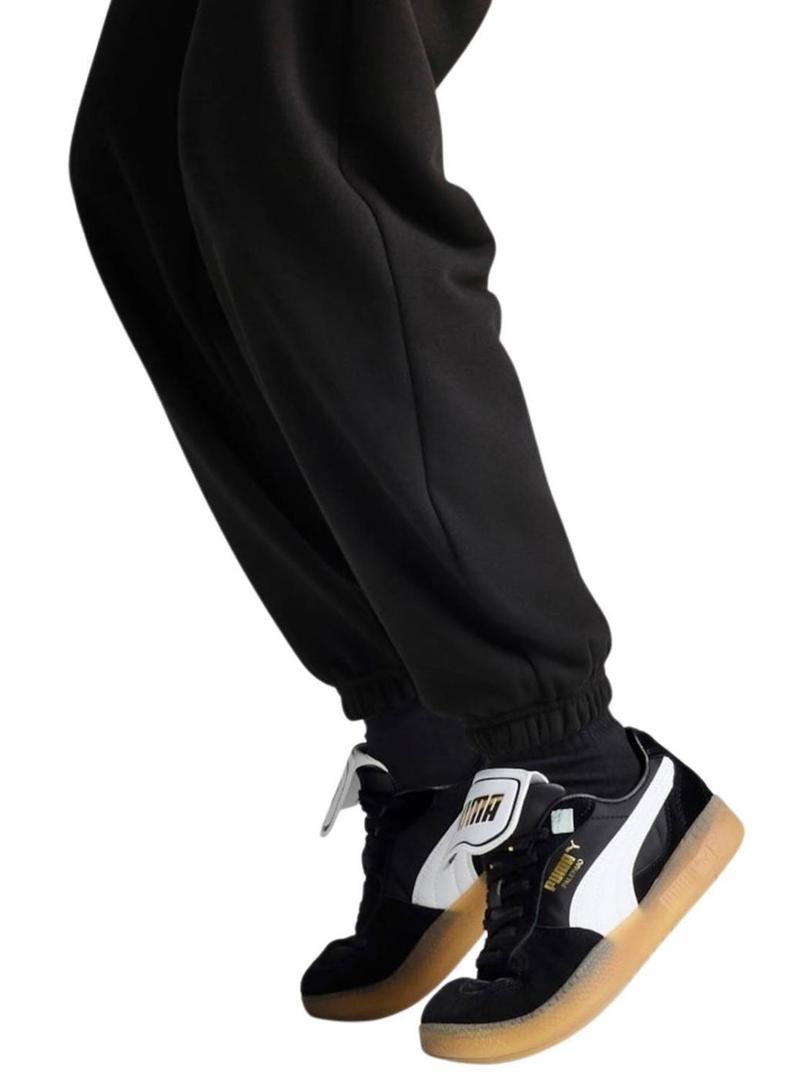 Calças Puma Wardrobe pretas para mulher.