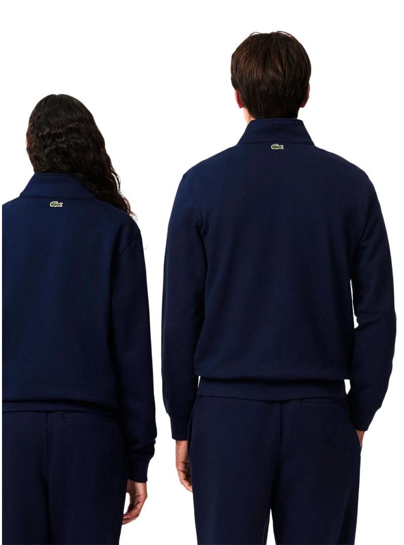 Moletom Lacoste com gola alta e zíper marinho para homens e mulheres.