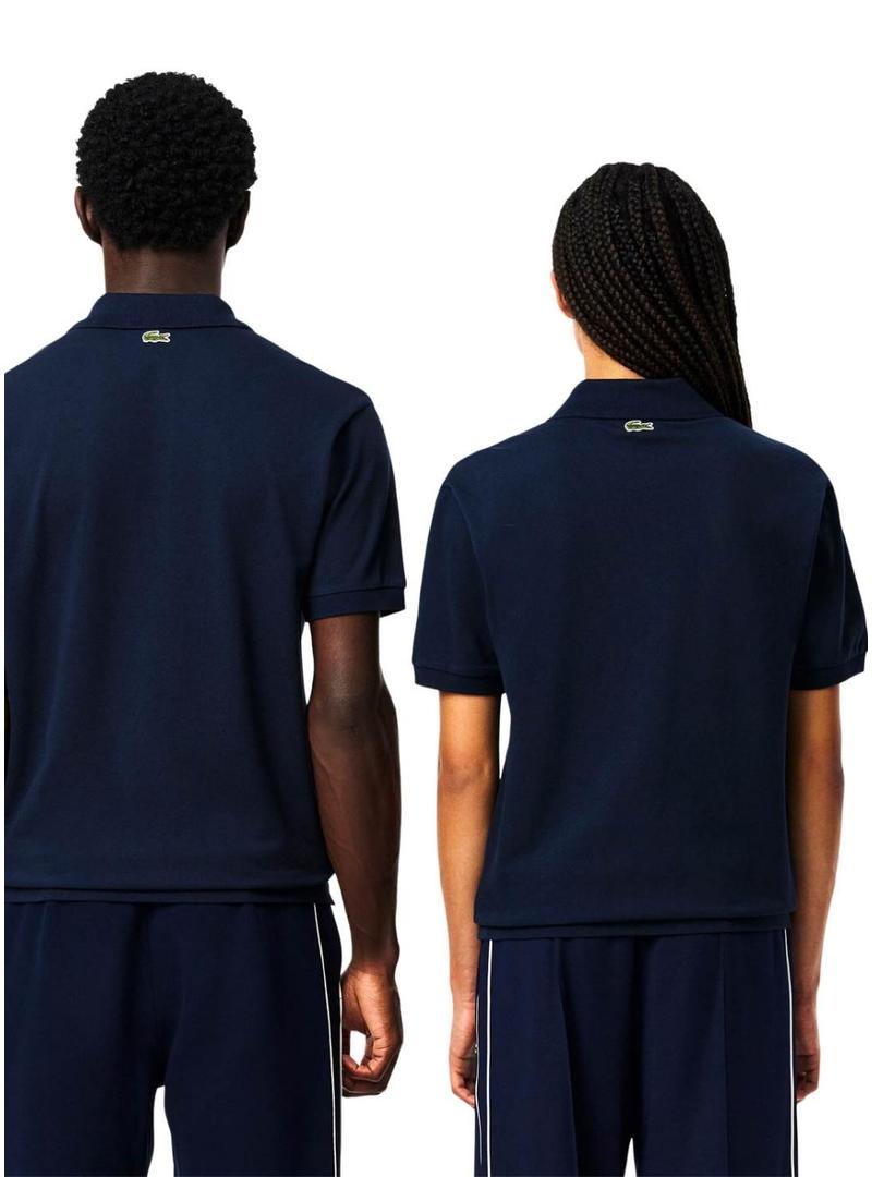 Polo Lacoste L.12.12 com logotipo estampado em marinho para homem e mulher.