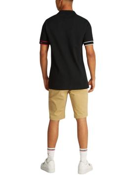 Camisa Polo Tommy Jeans Slim Flag preta para homem.