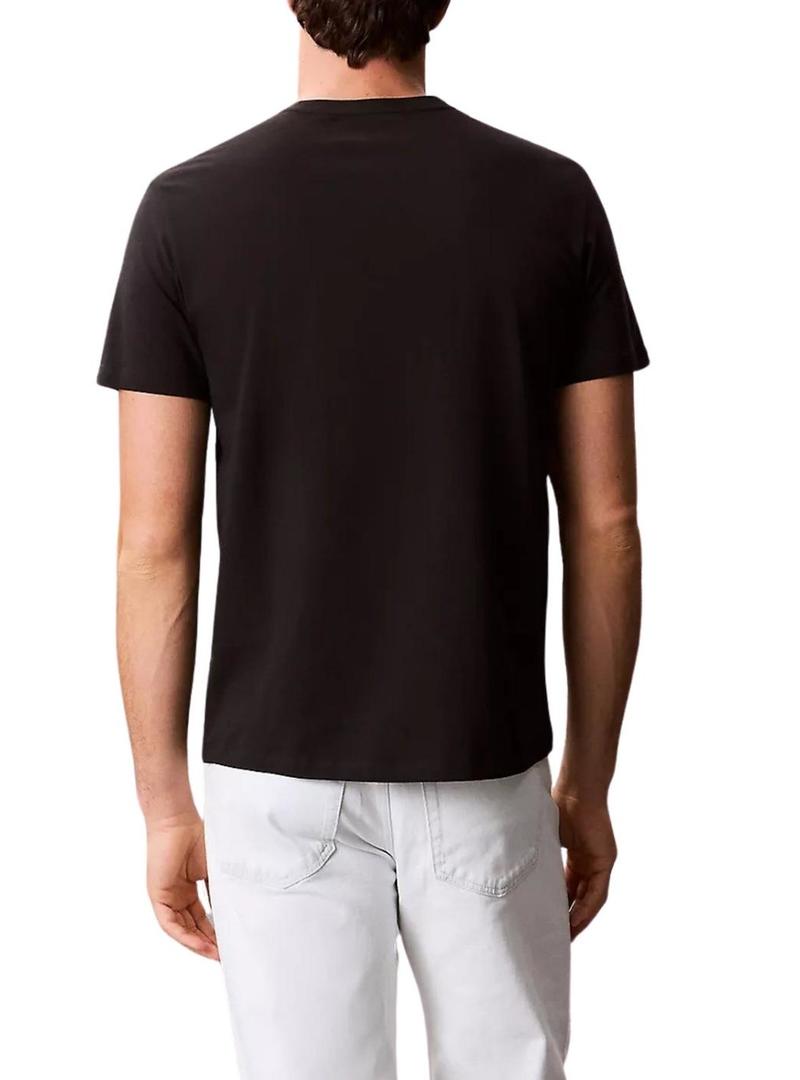 Camiseta Calvin Klein Jeans NY Word Stack preto para homem.