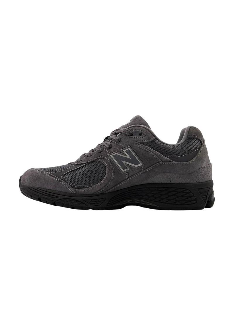 Sapatilhas New Balance U2002R roxas e pretas para homem.